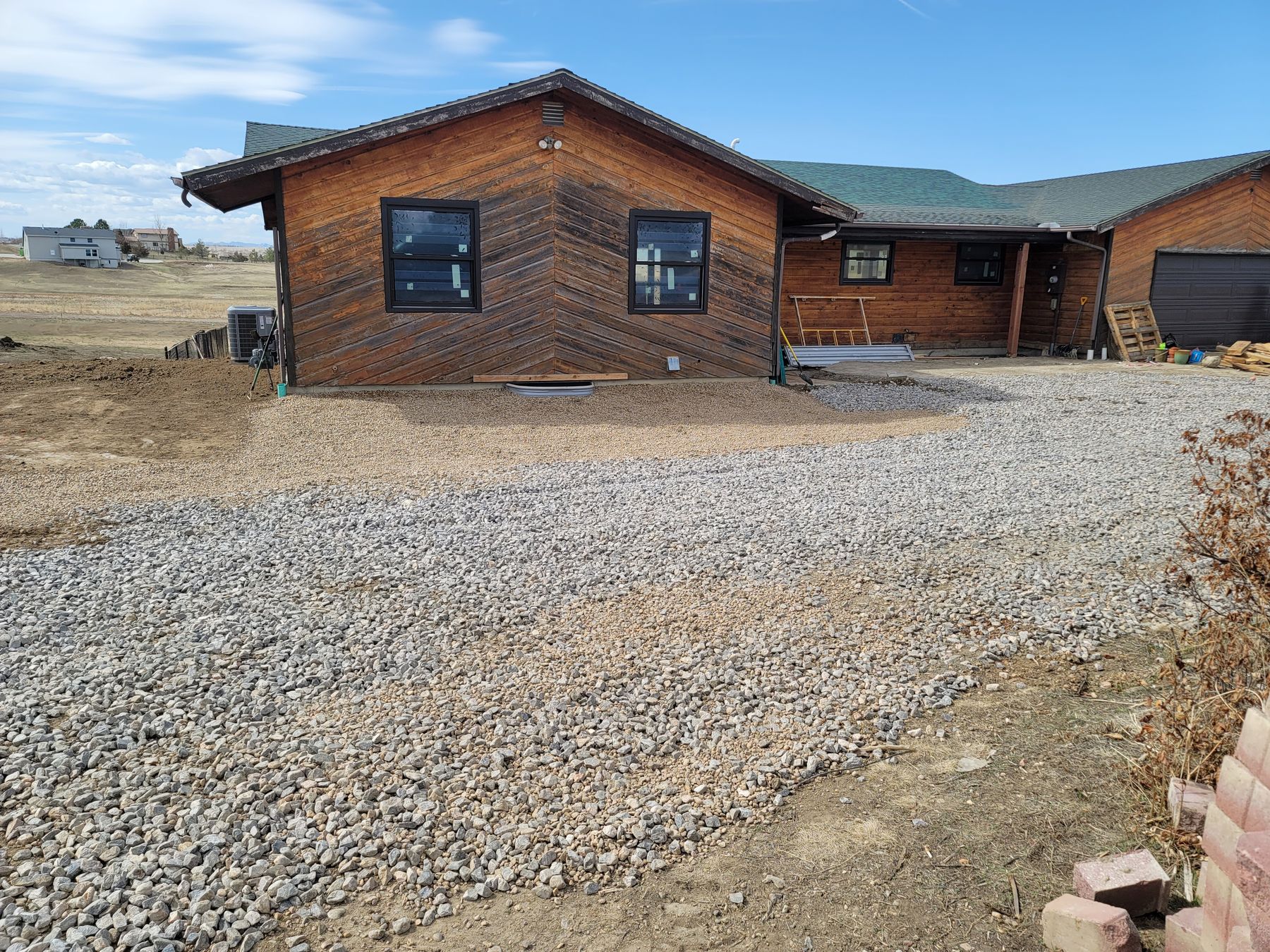 Finished gravel driveway at a mountain-metro home