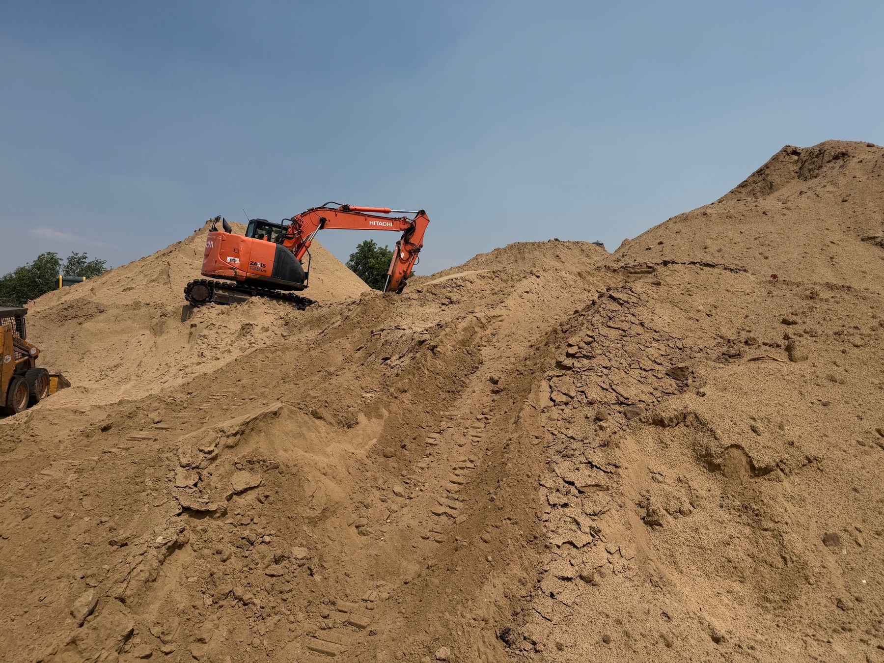 Hitachi ZX350-class excavator on a high cut